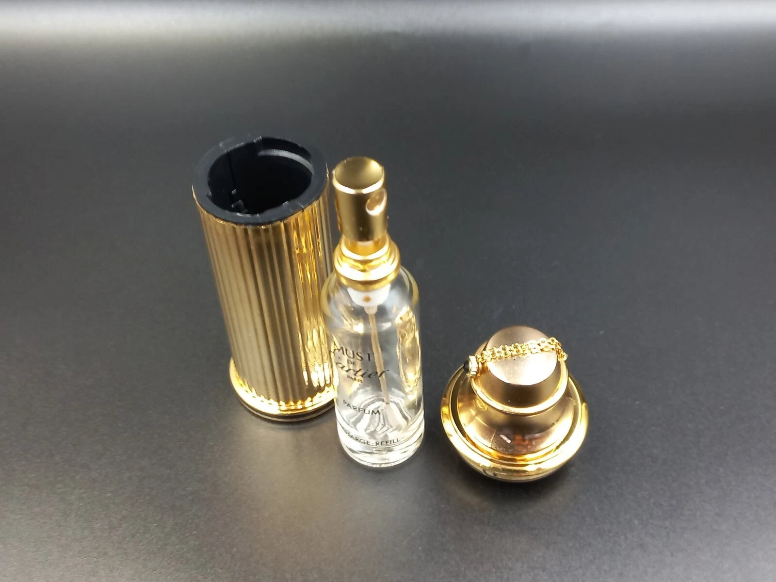 Vaporisateur rechargeable Cartier Doré pour Sac à Main – Luxe Occasion