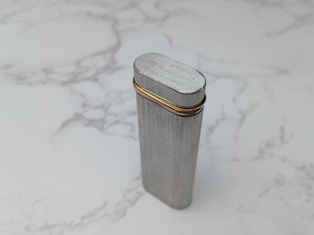 Briquet Cartier Trinity Plaqué Argent – Occasion