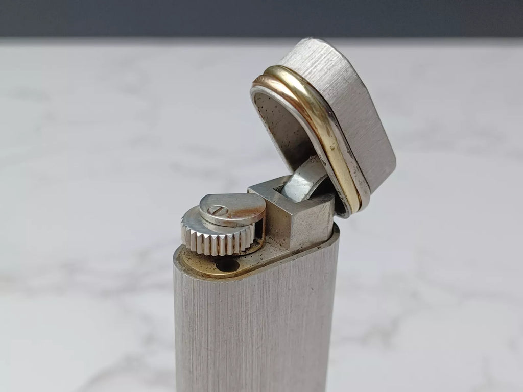 Briquet Cartier Trinity Plaqué Argent – Occasion