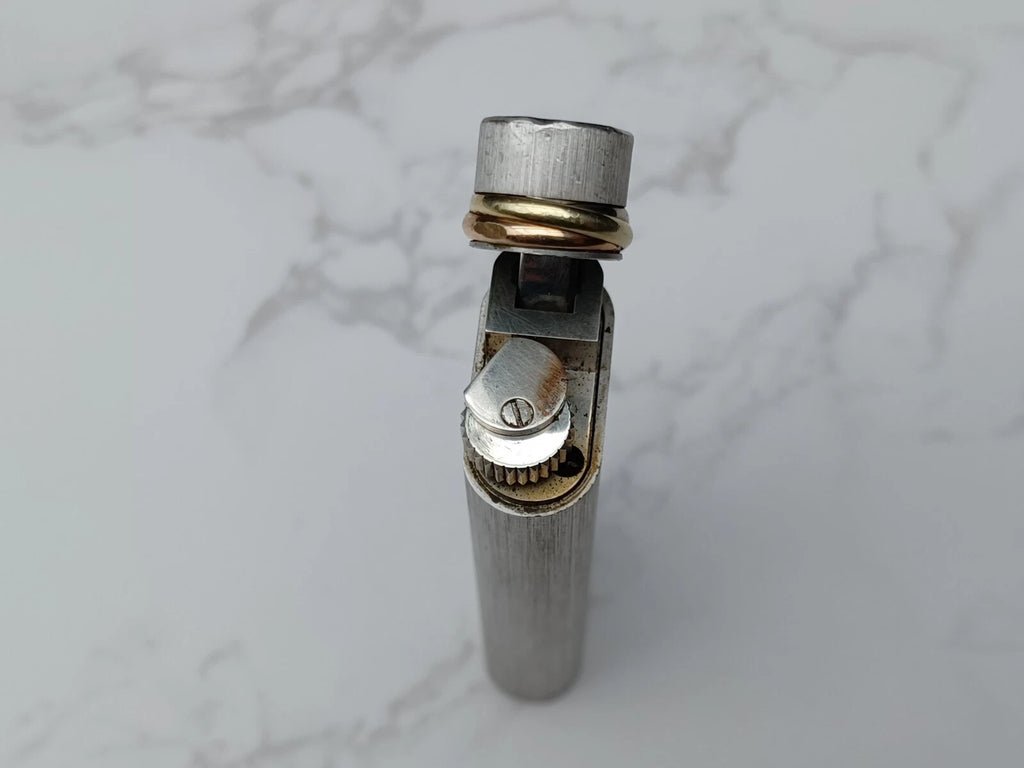 Briquet Cartier Trinity Plaqué Argent – Occasion