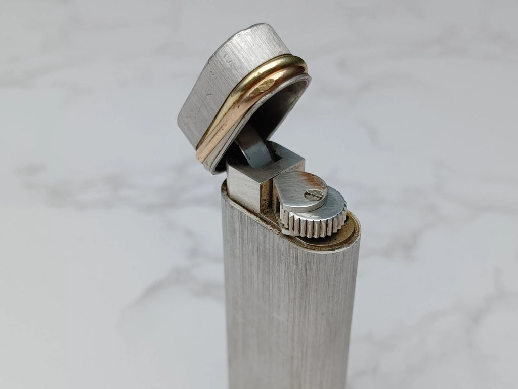 Briquet Cartier Trinity Plaqué Argent – Occasion